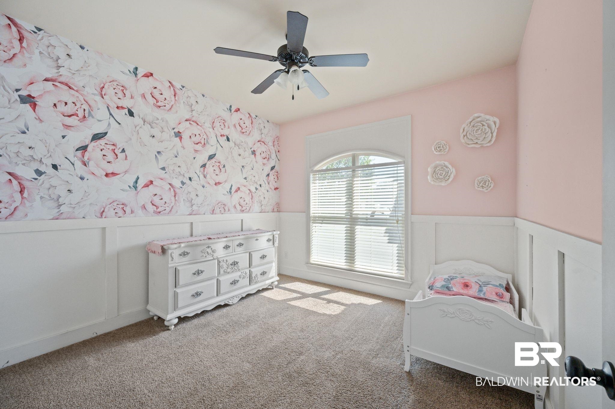 3879 Symphony Way West Semmes, AL 36575 - Photo 24 of 34 Carpeted bedroom featuring ceiling fan