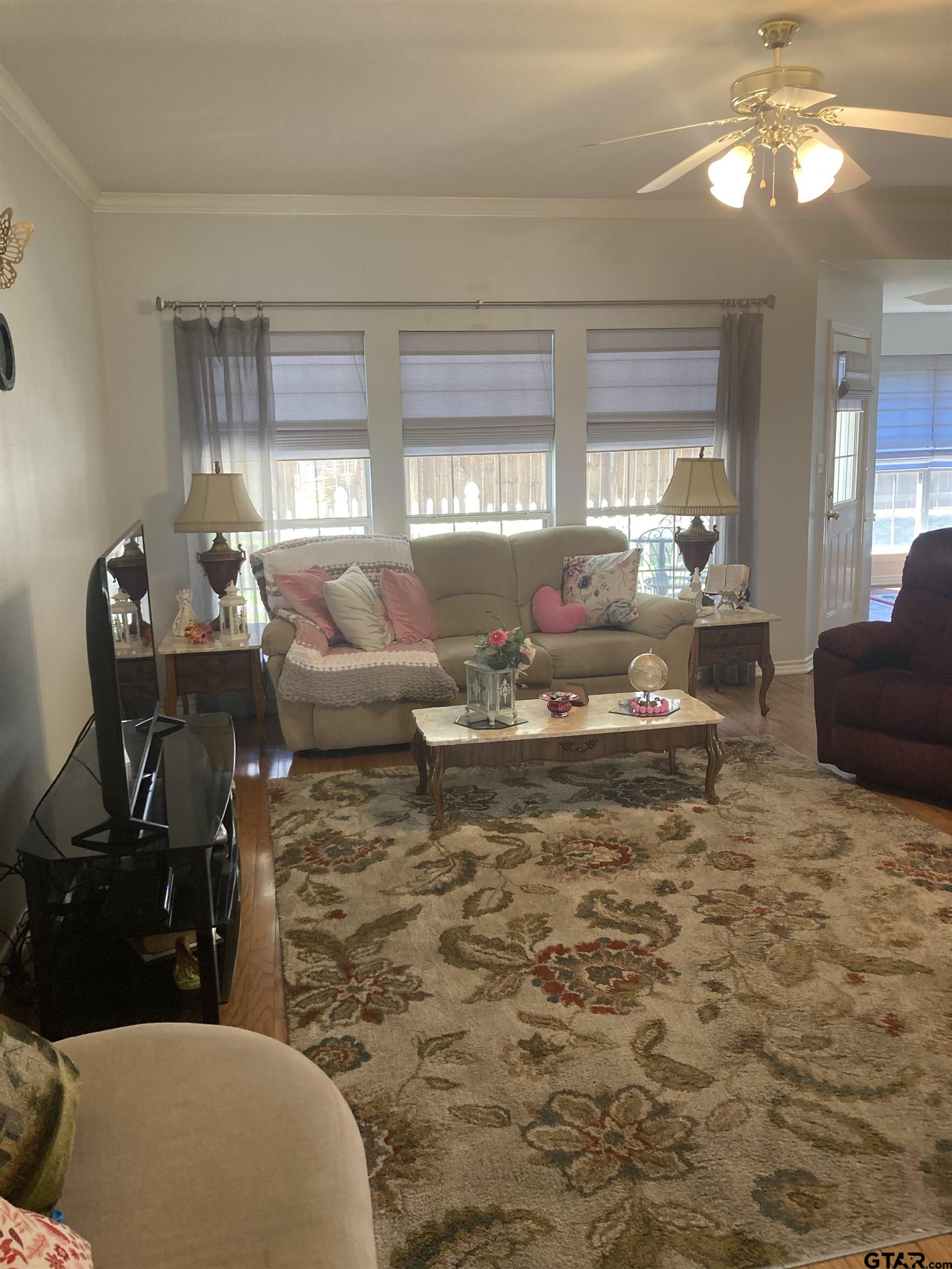 1521 Rice Road, Unit Q103 Tyler, TX 75703 - Photo 15 of 40 a living room with furniture