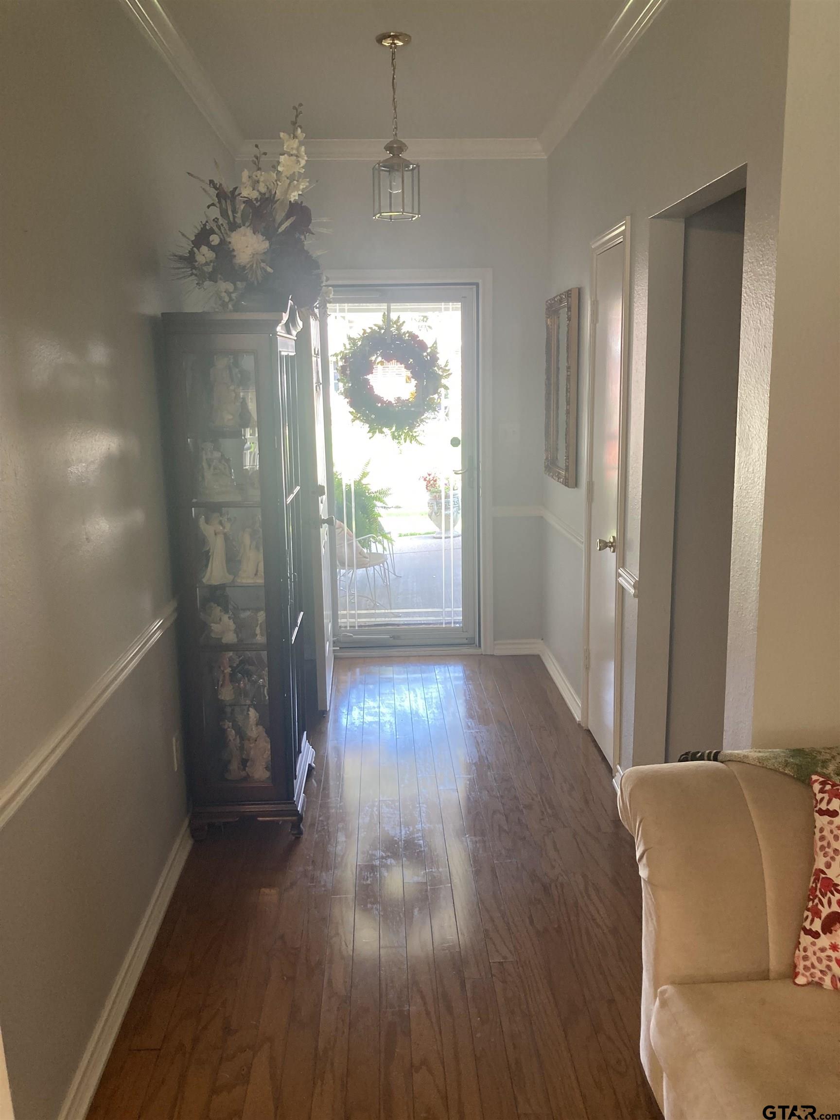 1521 Rice Road, Unit Q103 Tyler, TX 75703 - Photo 17 of 40 a view of livingroom with furniture and wooden floor