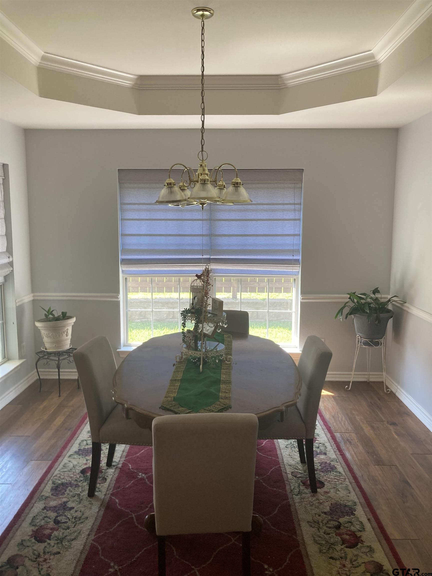 1521 Rice Road, Unit Q103 Tyler, TX 75703 - Photo 2 of 40 a view of a dining room with furniture window and outside view