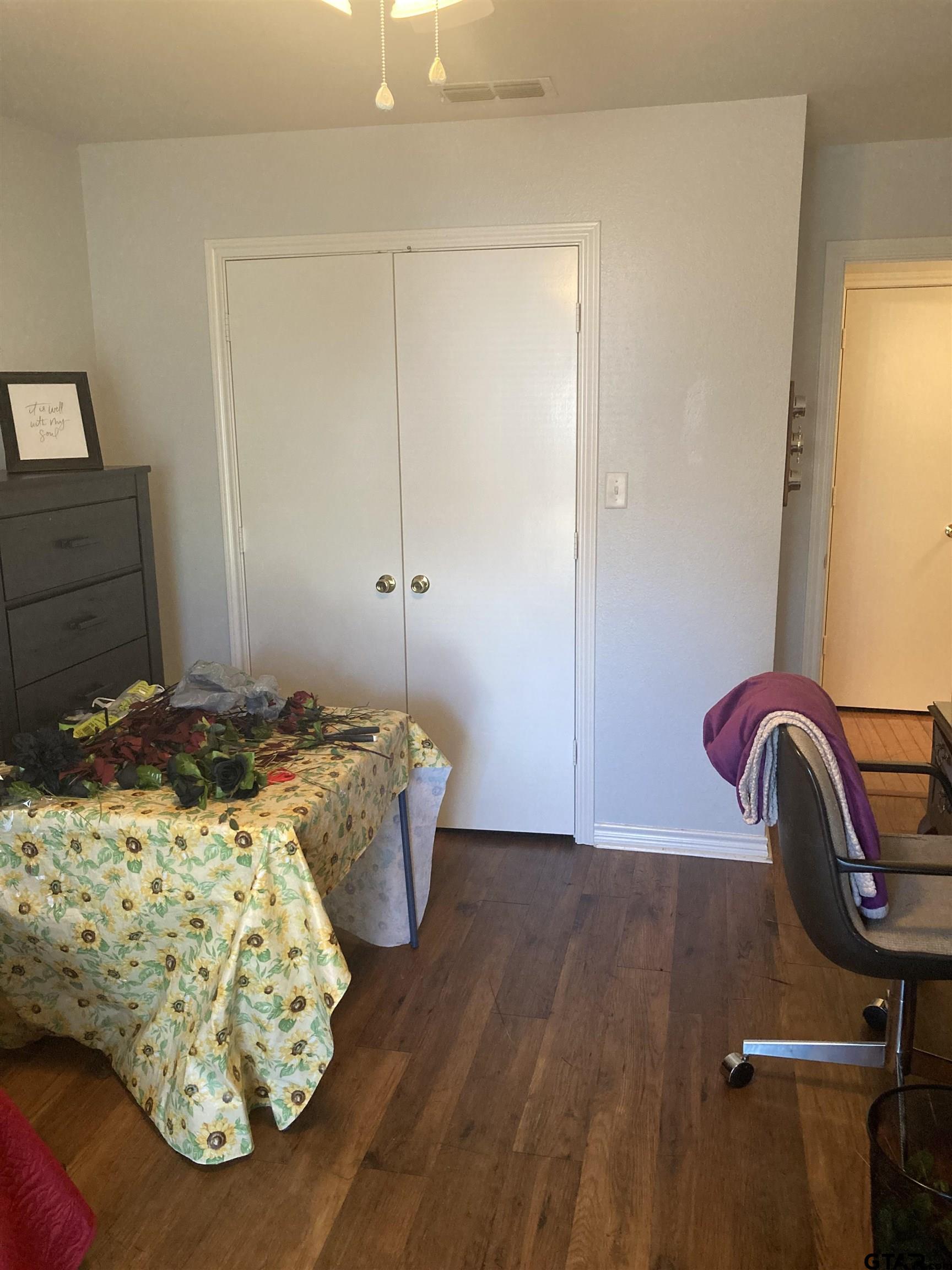 1521 Rice Road, Unit Q103 Tyler, TX 75703 - Photo 32 of 40 a bedroom with a bed and a window