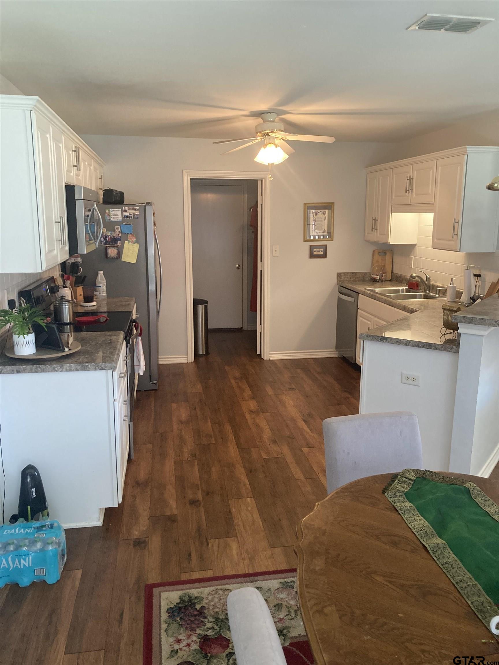 1521 Rice Road, Unit Q103 Tyler, TX 75703 - Photo 4 of 40 a view of a kitchen