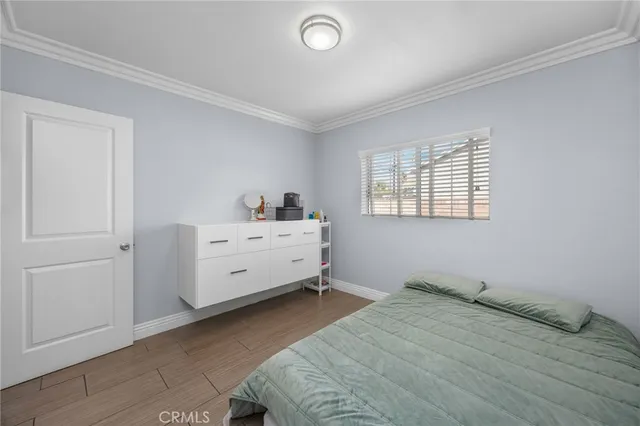 a room with a bed and a window