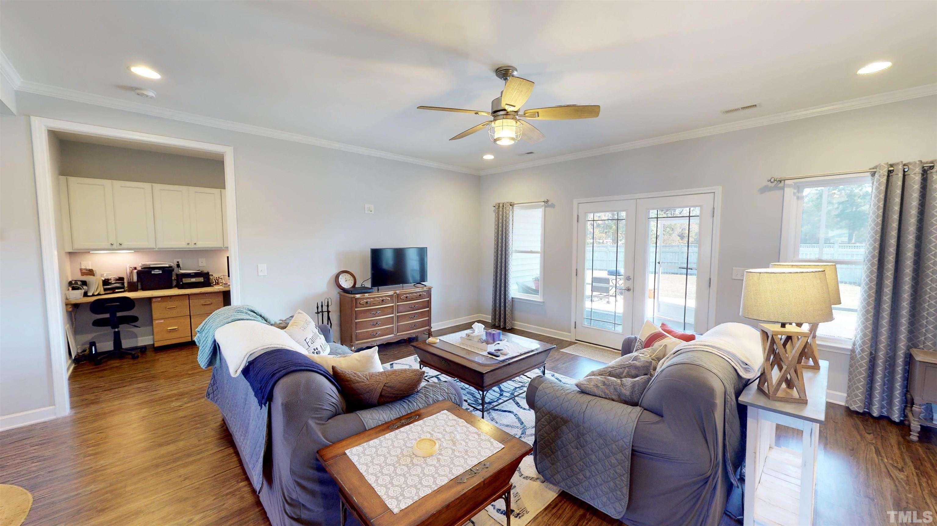 11250 Old Beulah Road Kenly, NC 27542 - Photo 18 of 66 a living room with furniture and wooden floor