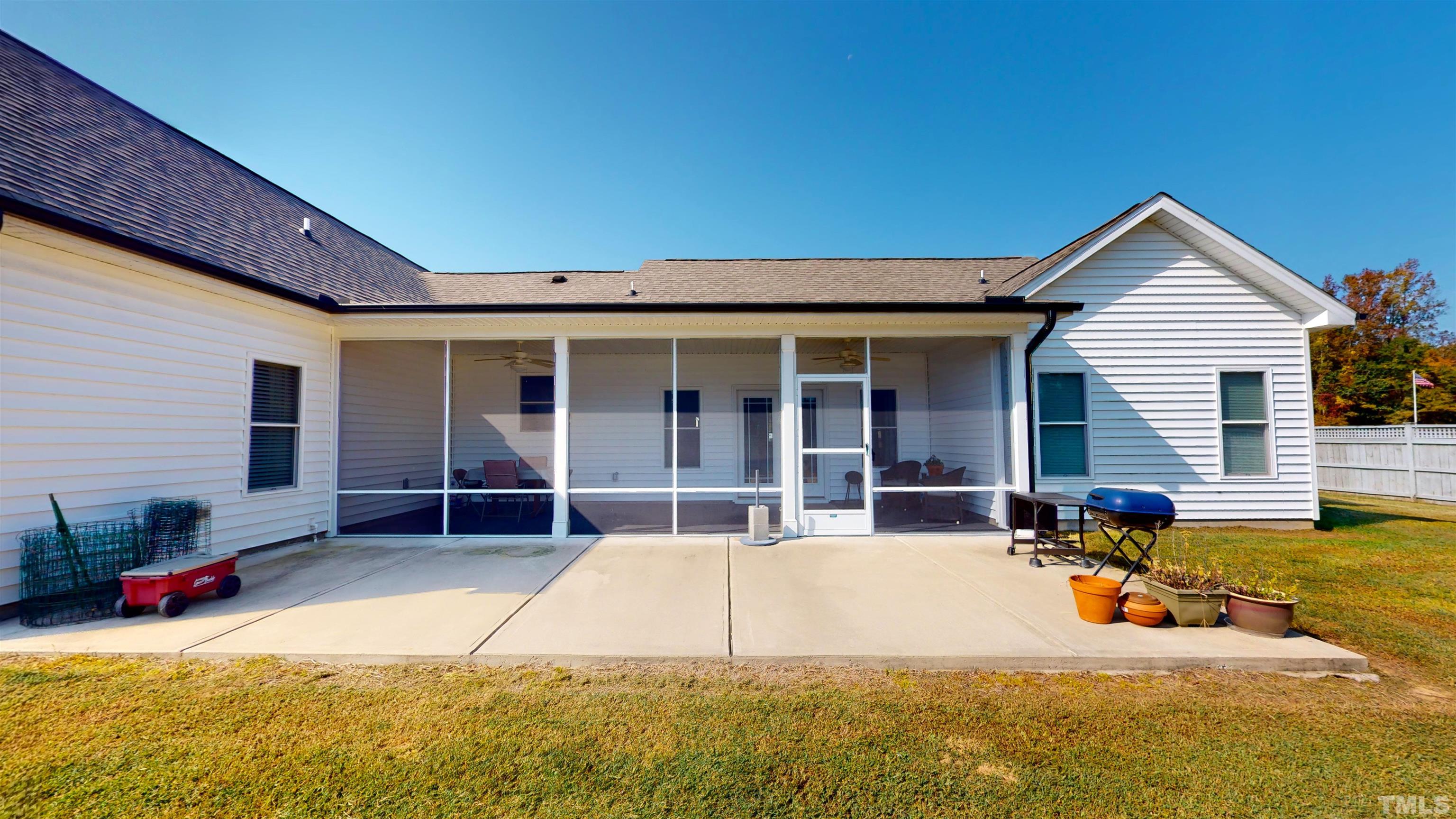 11250 Old Beulah Road Kenly, NC 27542 - Photo 43 of 66 a view of a house with swimming pool and sitting area