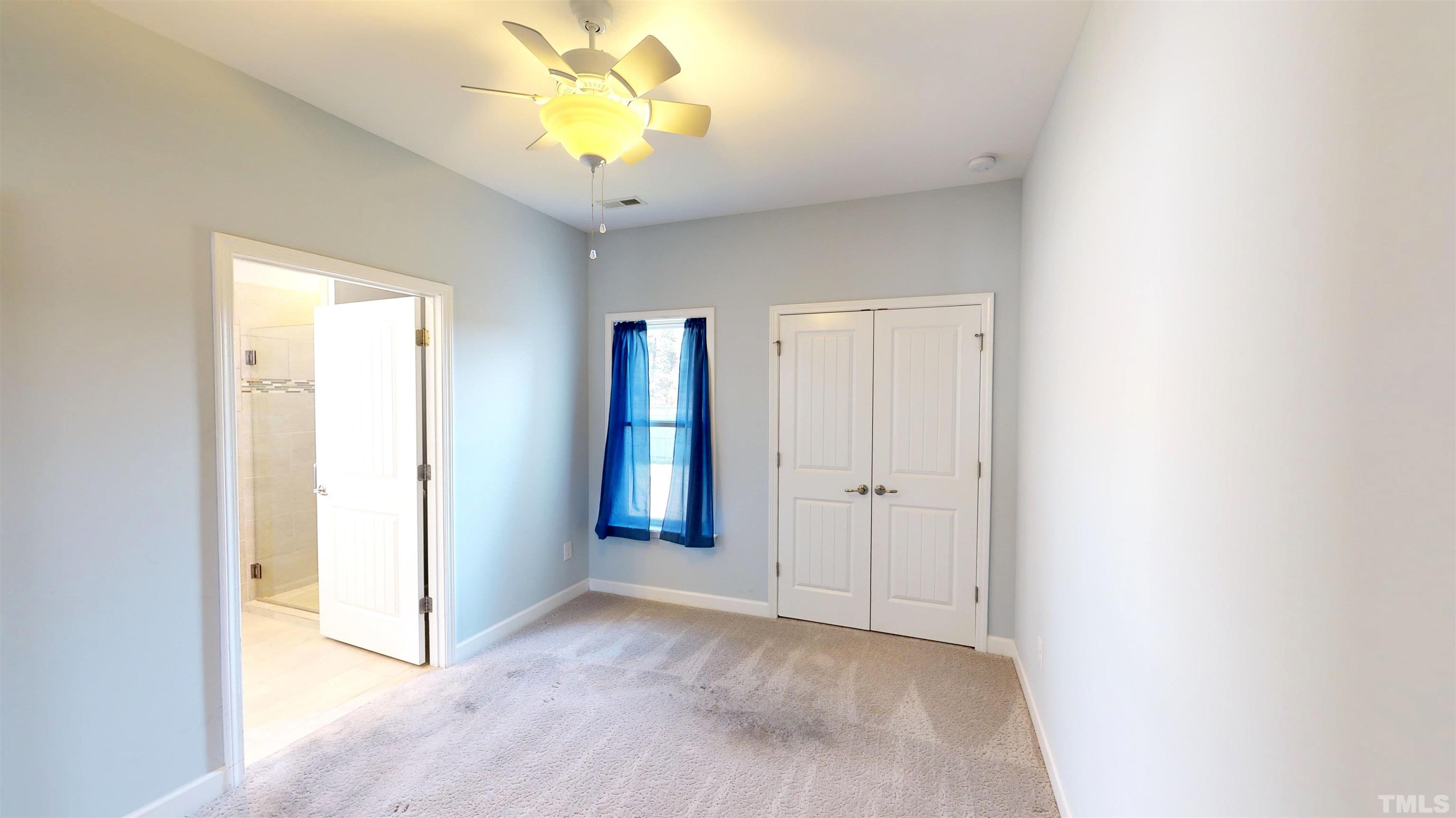 11250 Old Beulah Road Kenly, NC 27542 - Photo 52 of 66 a view of an empty room with a window