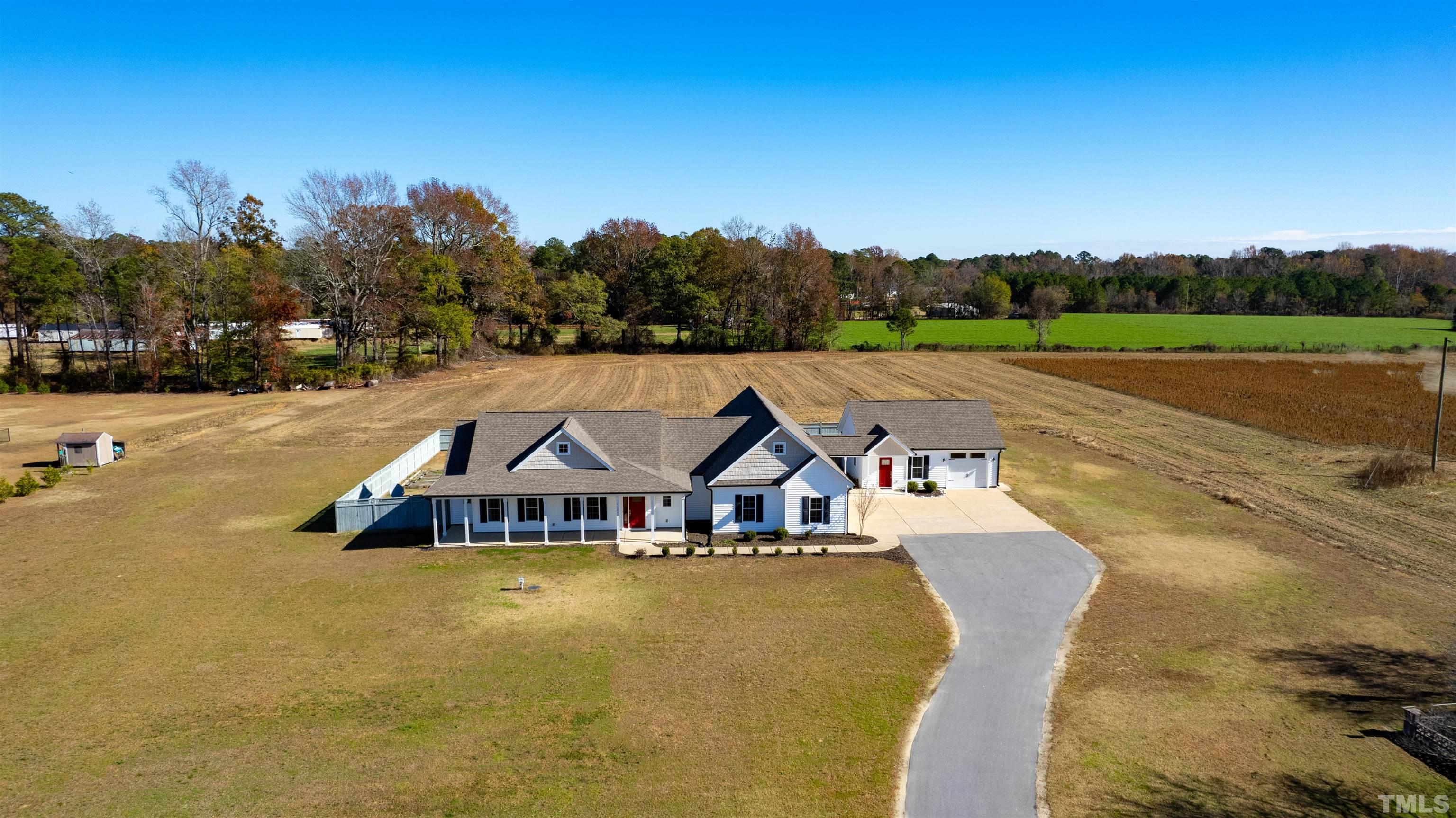 11250 Old Beulah Road Kenly, NC 27542 - Photo 57 of 66 a view of house with city street and trees in the background