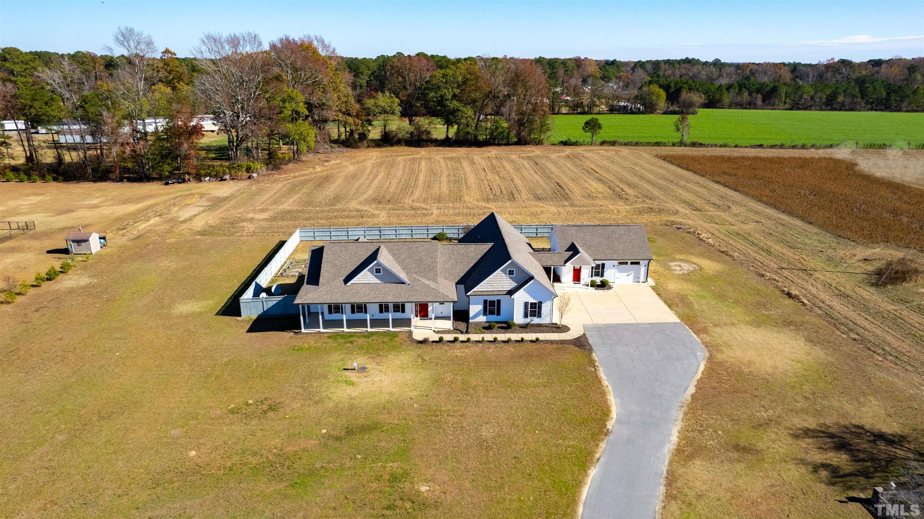 11250 Old Beulah Road Kenly, NC 27542 - Photo 58 of 66 a view of a swimming pool with a yard