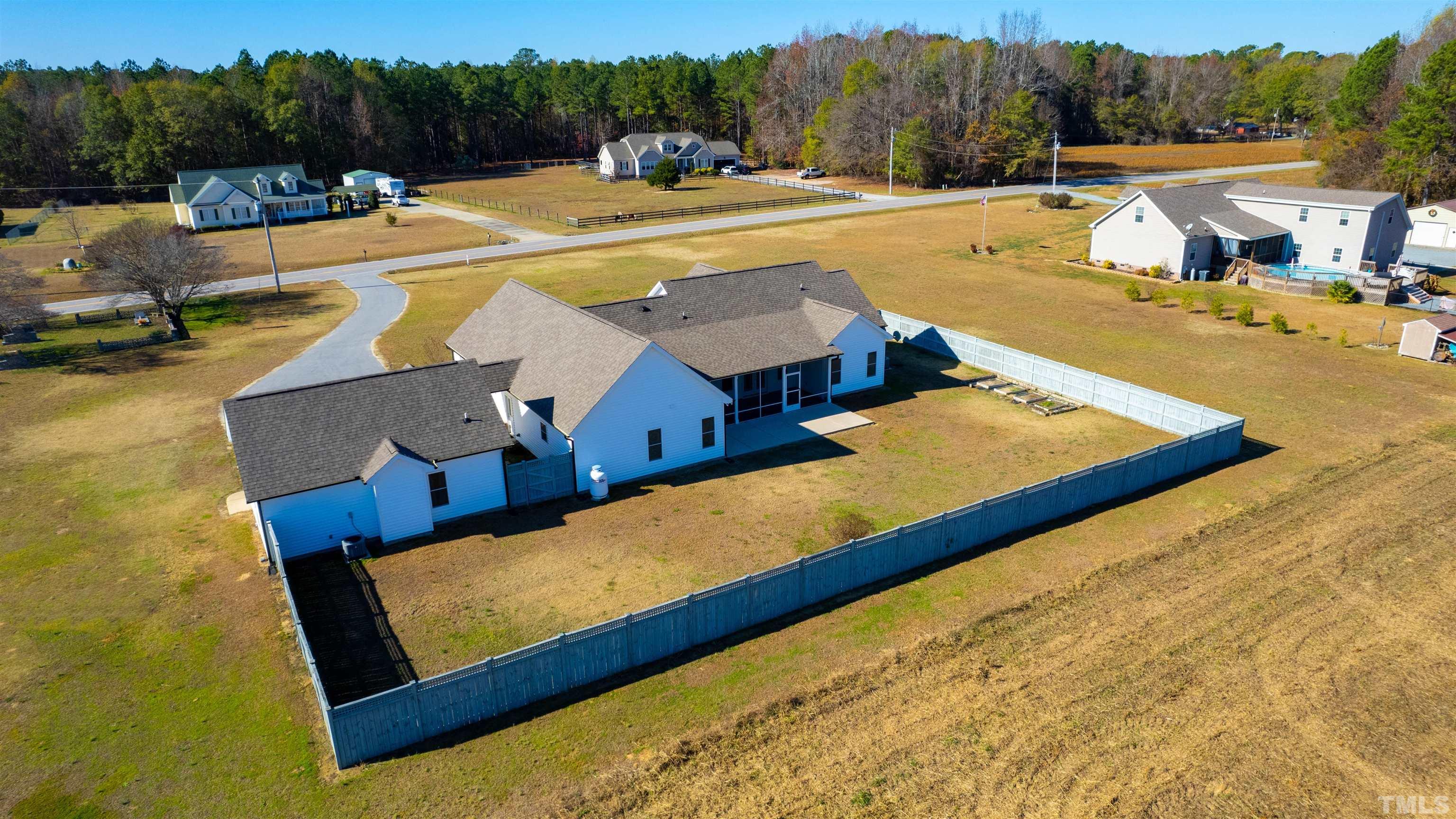 11250 Old Beulah Road Kenly, NC 27542 - Photo 61 of 66 a view of a swimming pool with lounge chairs