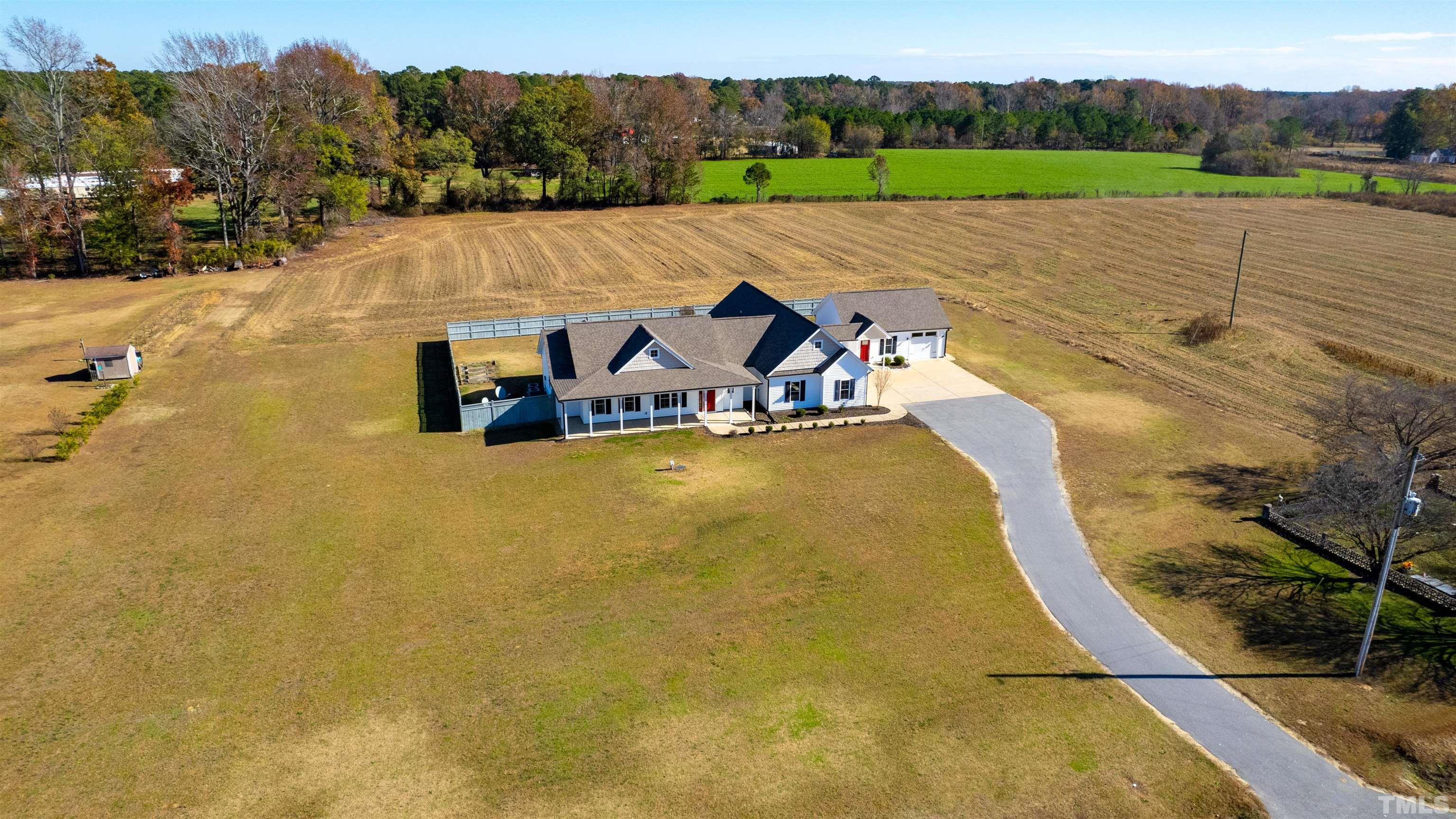 11250 Old Beulah Road Kenly, NC 27542 - Photo 65 of 66 a view of a swimming pool with a yard