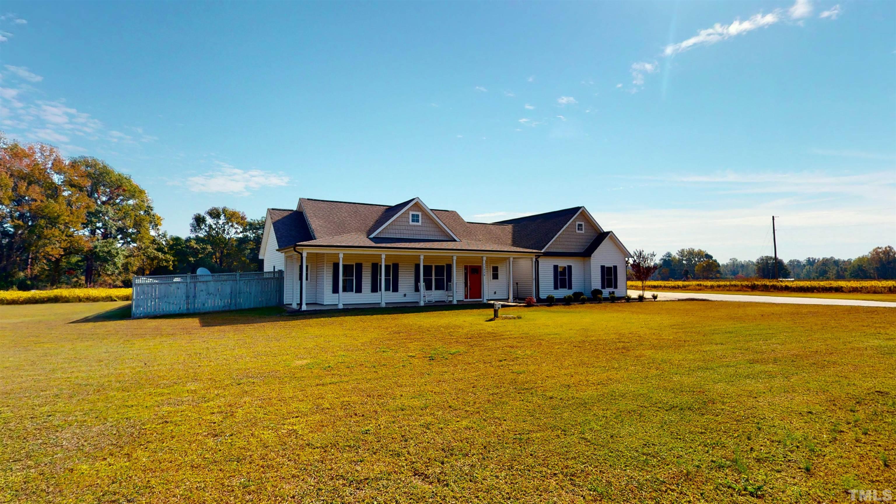 11250 Old Beulah Road Kenly, NC 27542 - Photo 9 of 66 a view of a house with a ocean view