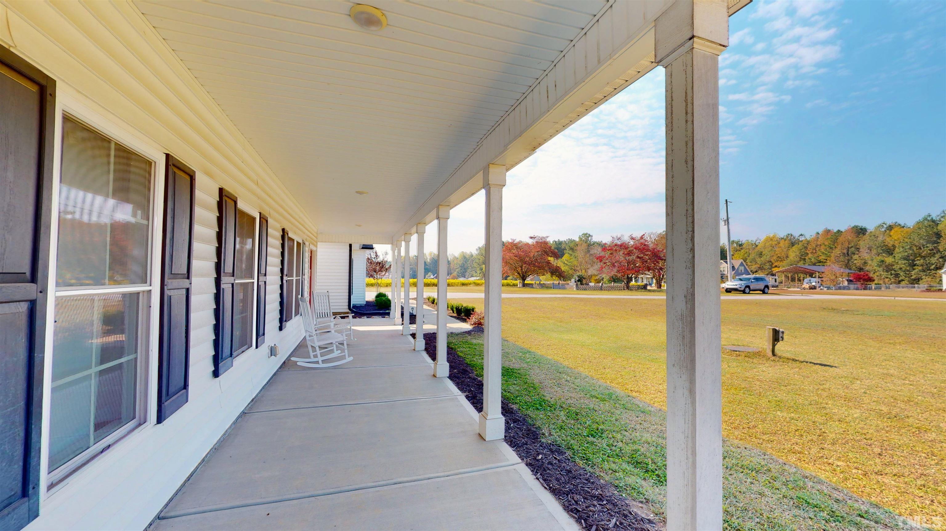 11250 Old Beulah Road Kenly, NC 27542 - Photo 10 of 66 a view of a balcony with ocean view