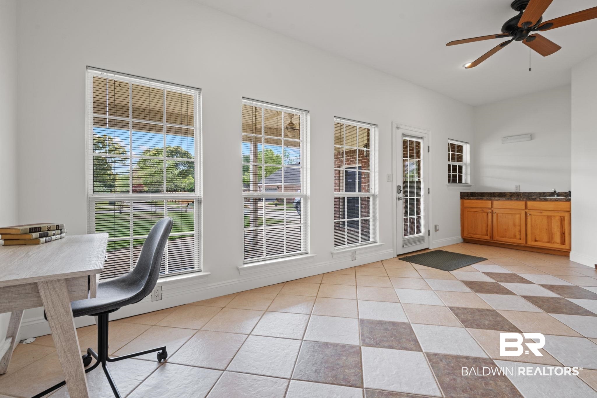 29634 St George Street Daphne, AL 36526 - Photo 35 of 47 Dining area featuring a ceiling fan and light tile patterned floors