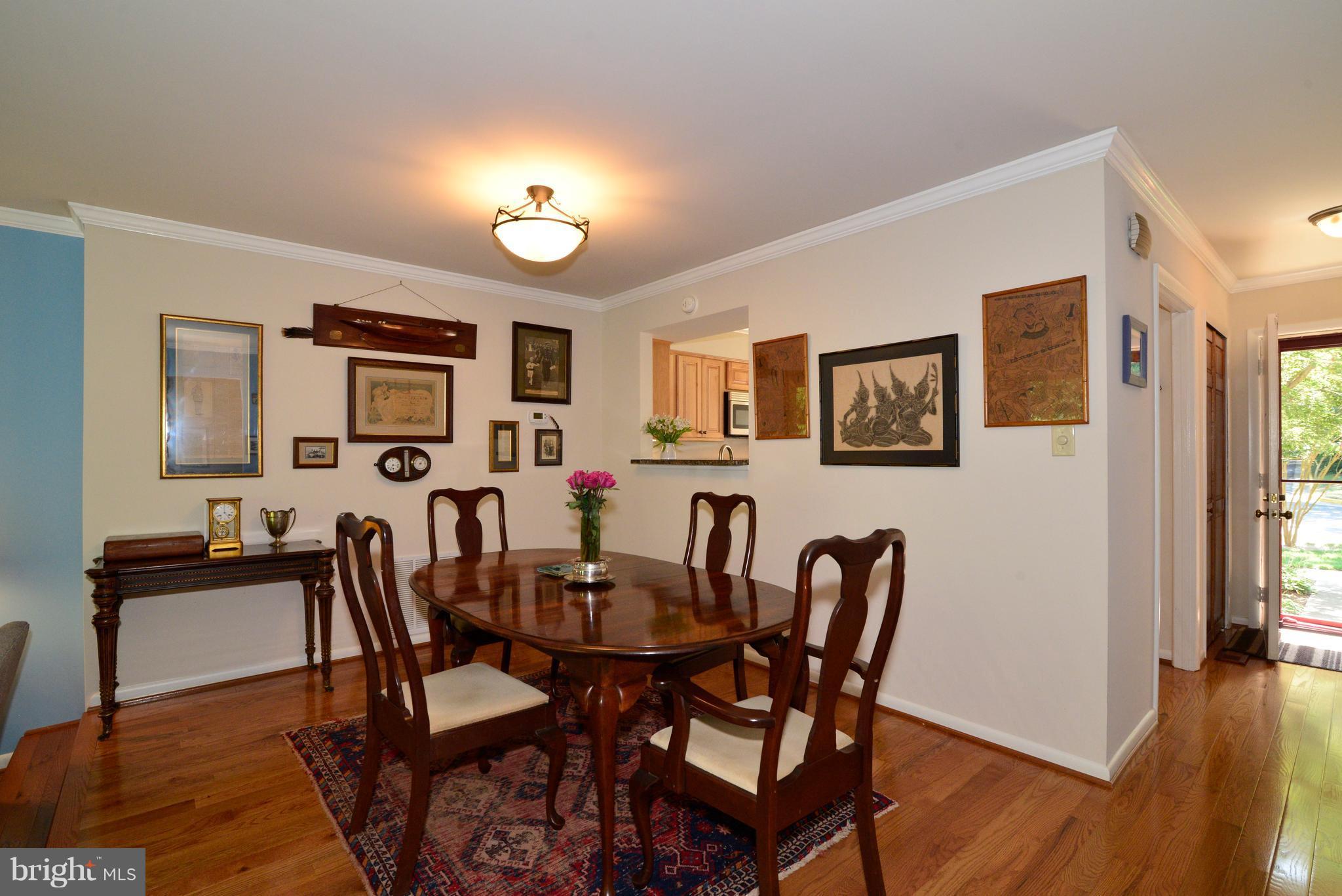 2048 Swans Neck Way Reston, VA 20191 - Photo 4 of 22 The Dining Room features hardwood floors.