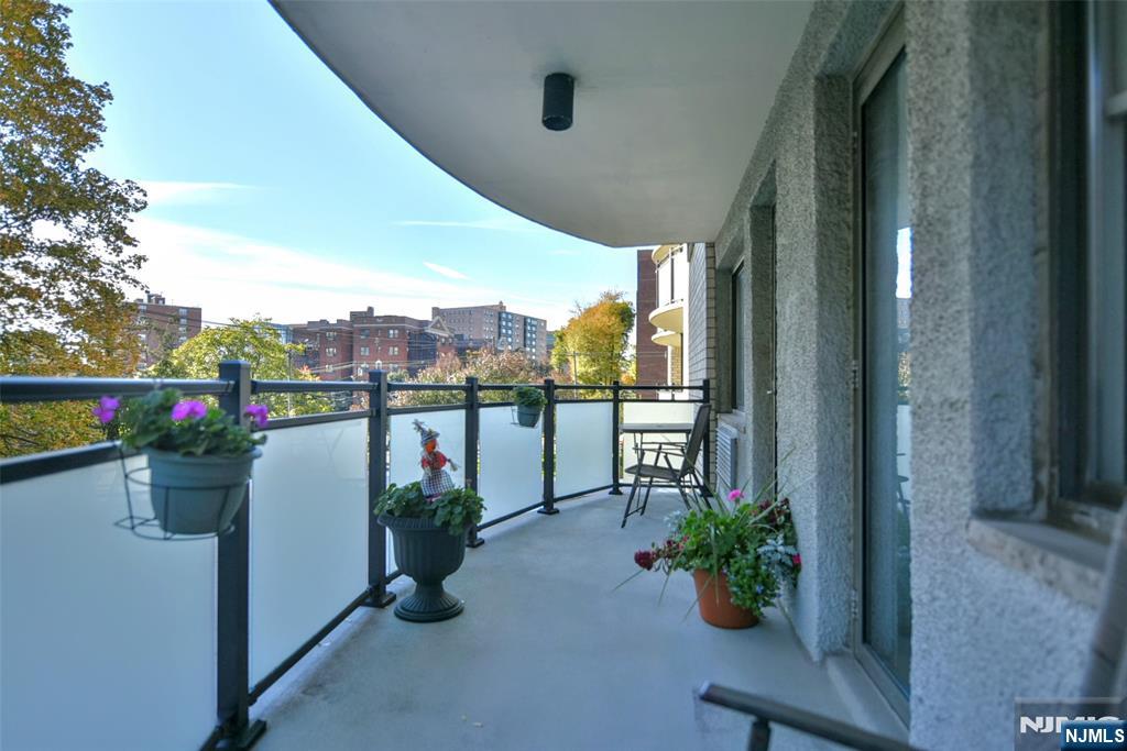 125 Prospect Avenue, Unit 3J Hackensack, NJ 07601 - Photo 19 of 25 an outdoor space with seating space