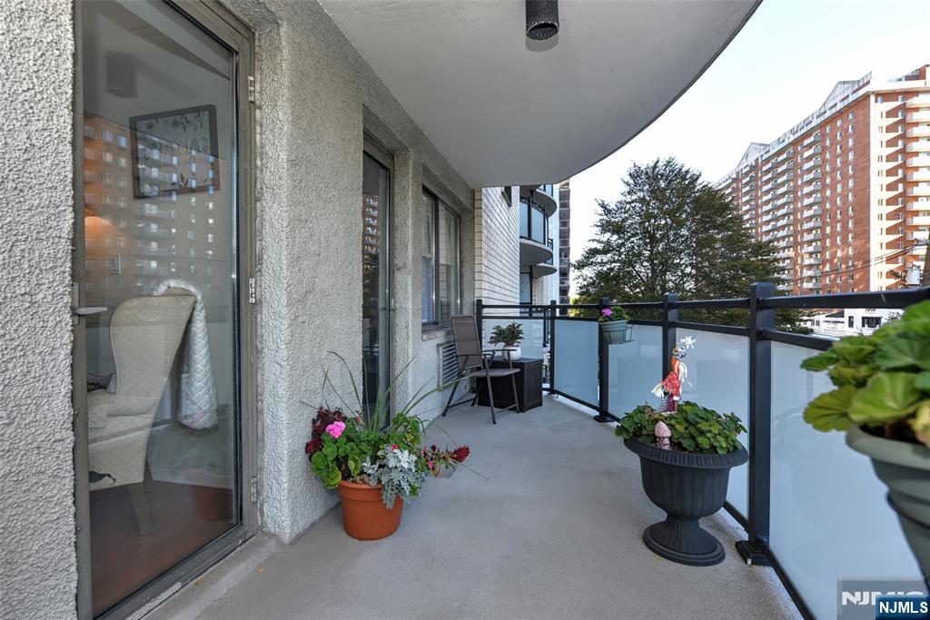 125 Prospect Avenue, Unit 3J Hackensack, NJ 07601 - Photo 20 of 25 a view of a path along with potted plant