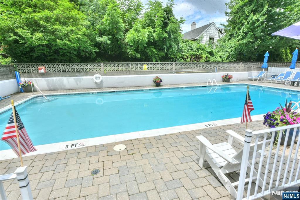 125 Prospect Avenue, Unit 3J Hackensack, NJ 07601 - Photo 21 of 25 a view of swimming pool with seating space