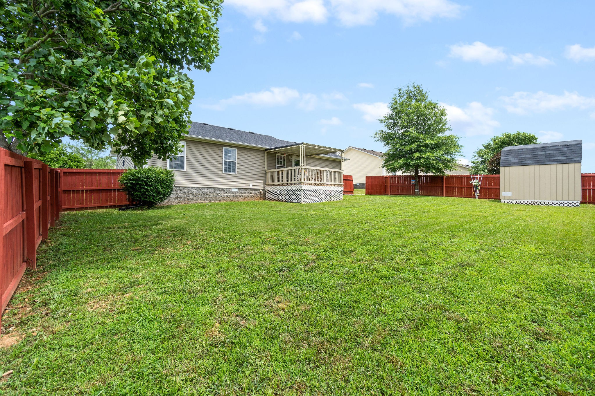615 Avondale Road Oak Grove, KY 42262 - Photo 30 of 35 a view of a house with a yard and a large tree