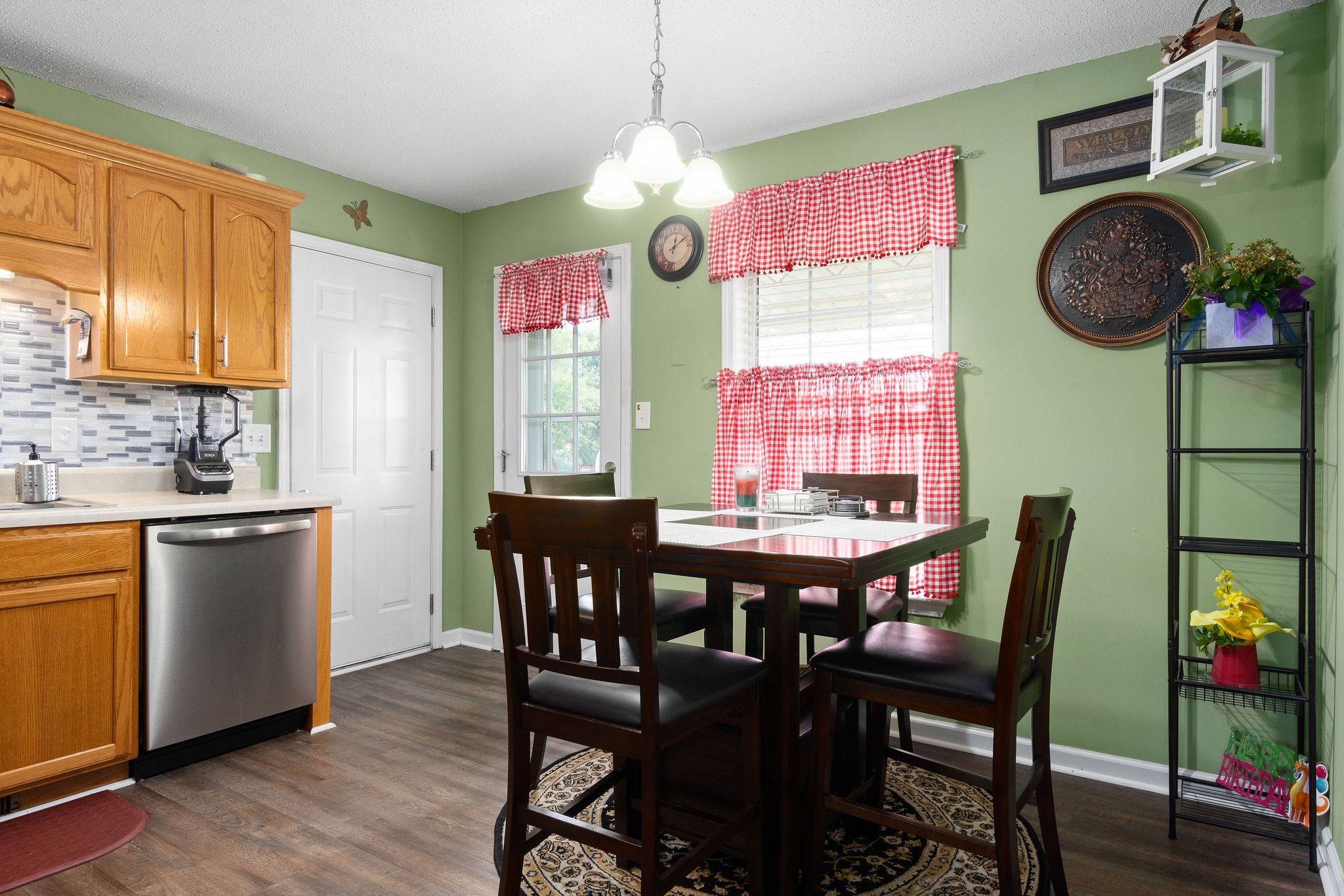 615 Avondale Road Oak Grove, KY 42262 - Photo 10 of 35 a view of a dining room with furniture and chandelier
