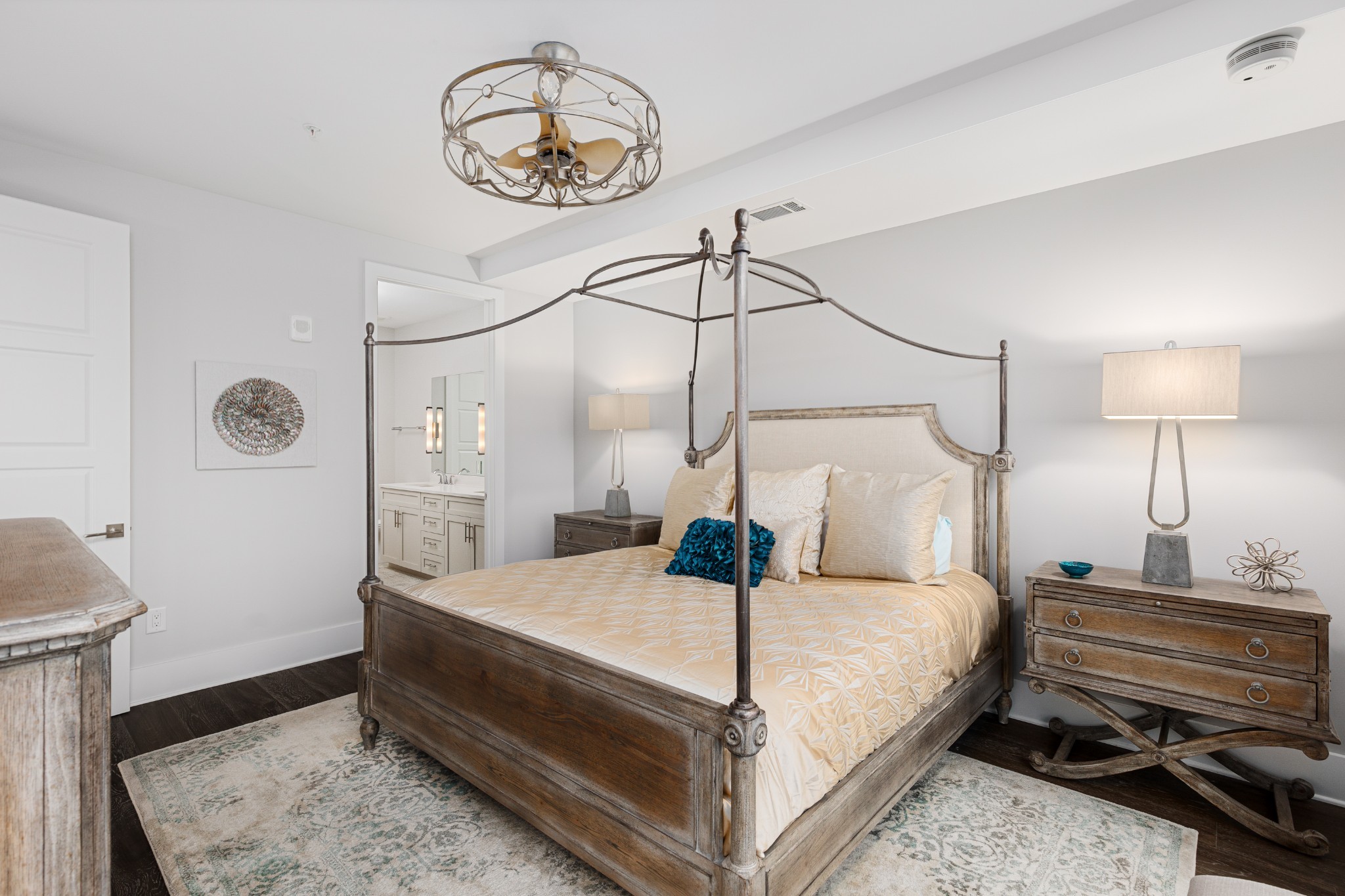 20 Rutledge Street, Unit 508 Nashville, TN 37210 - Photo 18 of 47 a bedroom with a bed a chandelier and closet