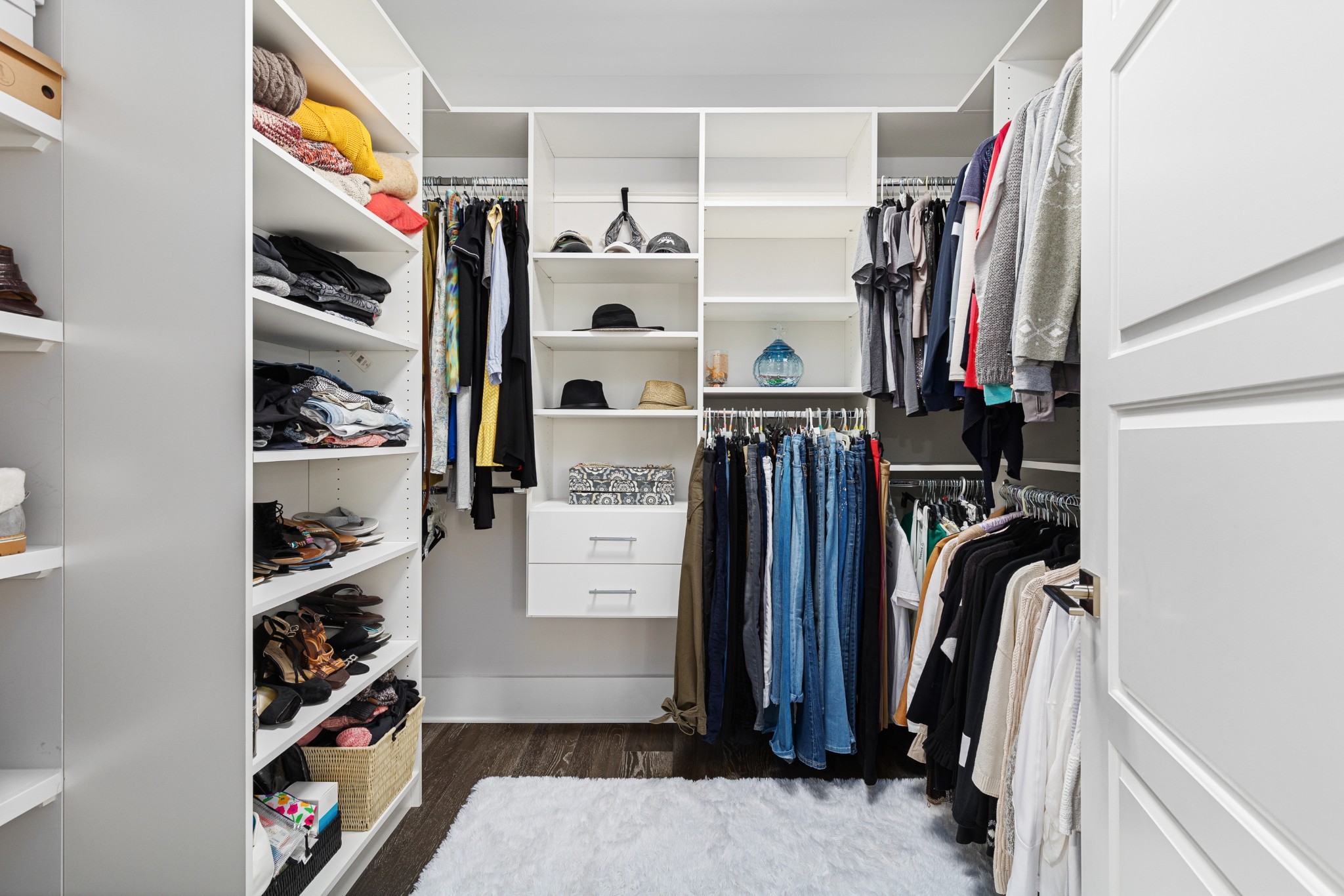 20 Rutledge Street, Unit 508 Nashville, TN 37210 - Photo 21 of 47 a view of walk in closet with clothes and shoes