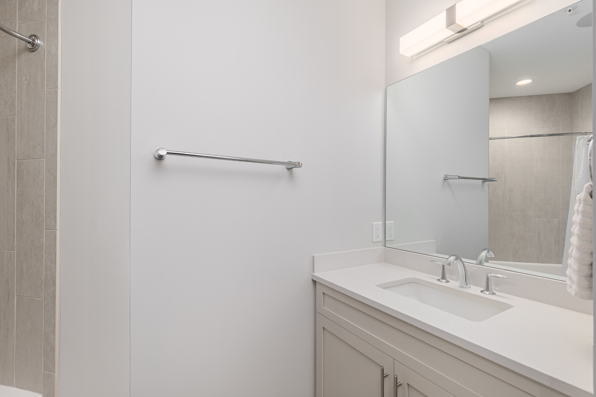 20 Rutledge Street, Unit 508 Nashville, TN 37210 - Photo 27 of 47 a bathroom with a sink and a mirror