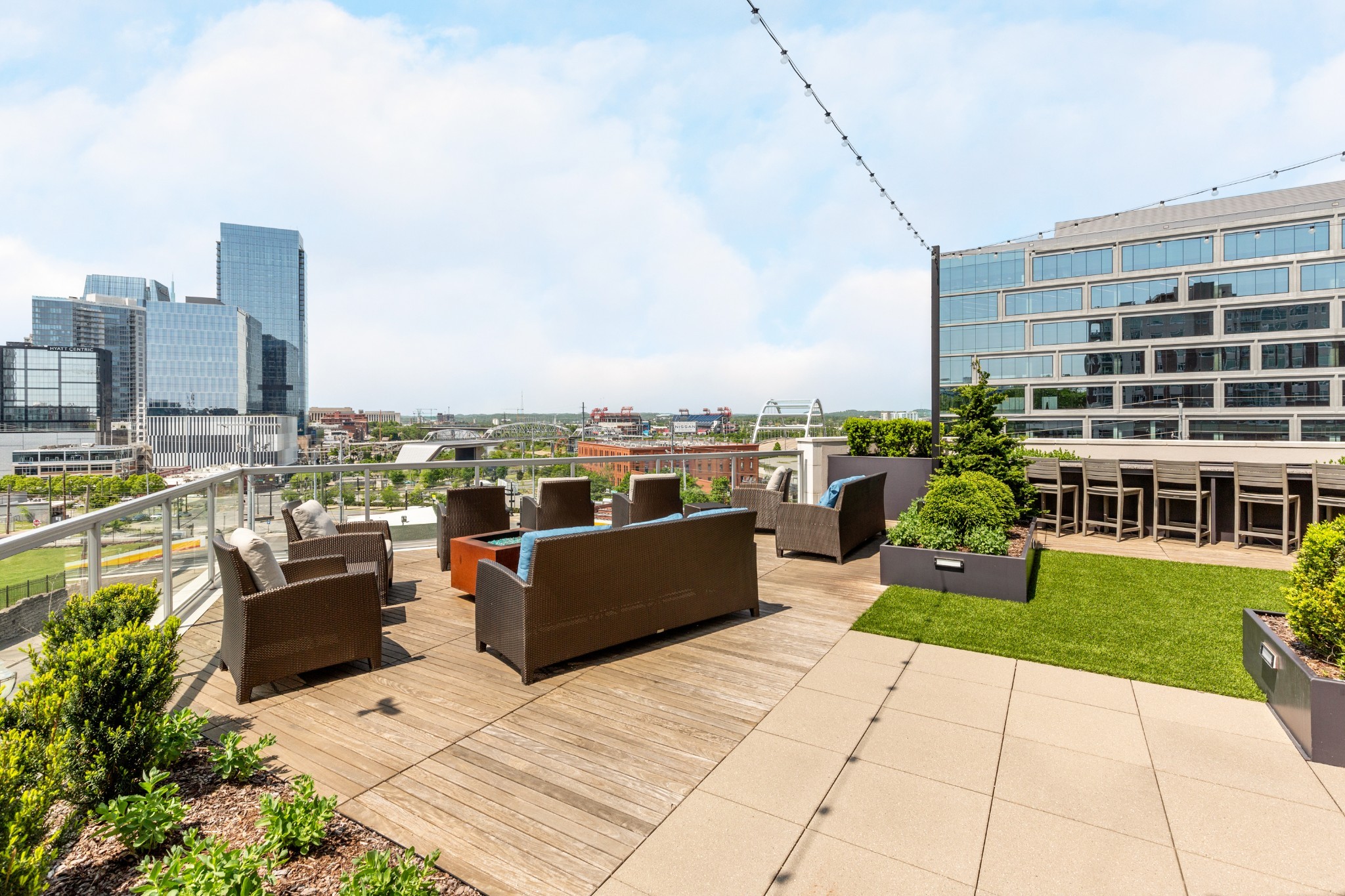 20 Rutledge Street, Unit 508 Nashville, TN 37210 - Photo 35 of 47 a view of a patio with couches and city view
