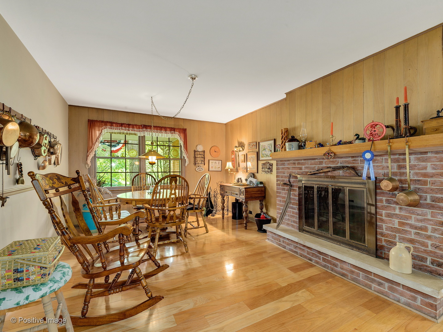 S206 Summit Drive Winfield, IL 60190 - Photo 12 of 34 a living room with furniture a fireplace and city view