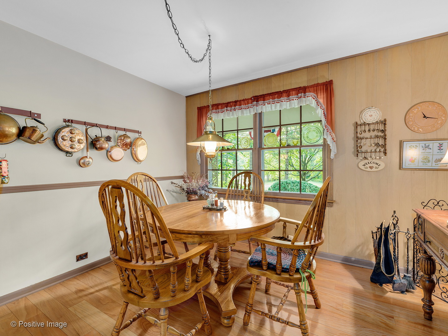 S206 Summit Drive Winfield, IL 60190 - Photo 13 of 34 a dining room with furniture and wooden floor