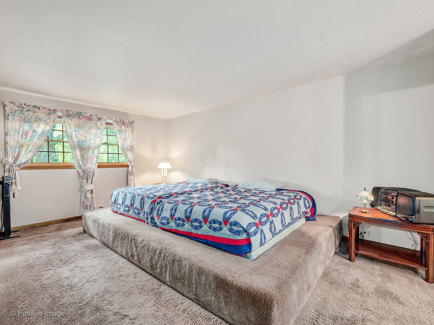 S206 Summit Drive Winfield, IL 60190 - Photo 18 of 34 a bedroom with a bed and window