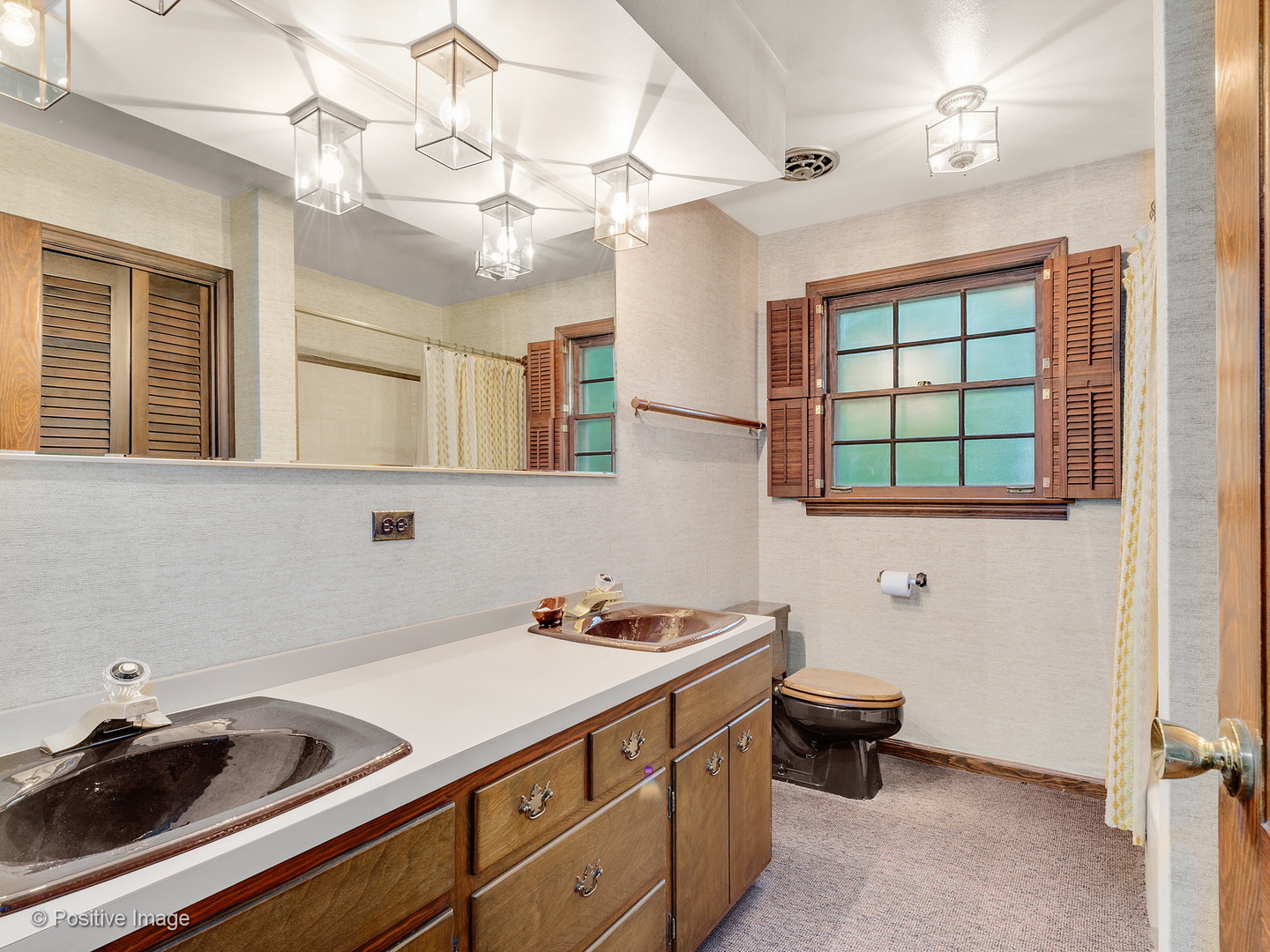 S206 Summit Drive Winfield, IL 60190 - Photo 22 of 34 a kitchen with a sink and cabinets