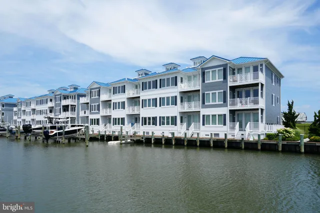 a view of a lake with building in front of it
