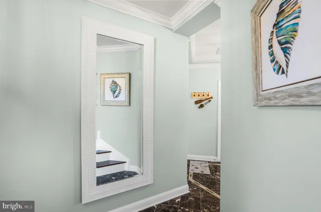 a dining room with furniture window and wooden floor