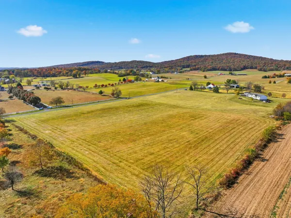 a view of an ocean and a mountain