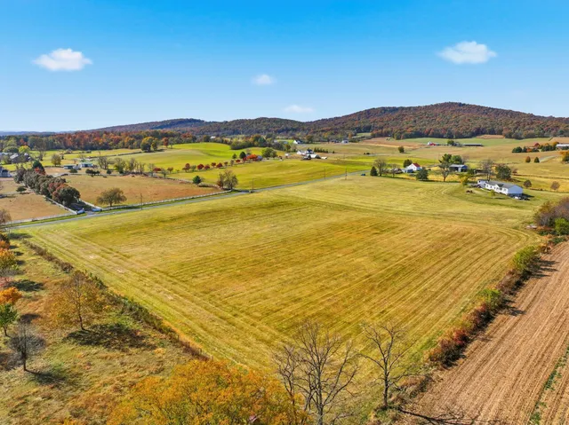 a view of an ocean and a mountain