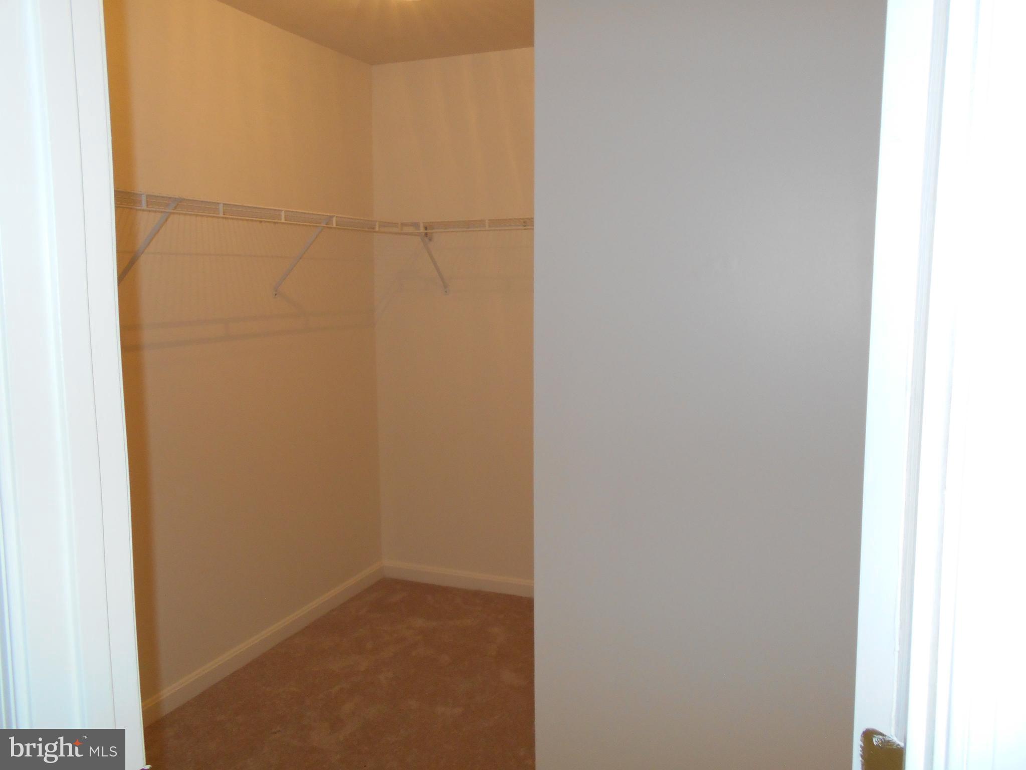 306 Appleby School Road Cambridge, MD 21613 - Photo 16 of 24 Her walk-in closet