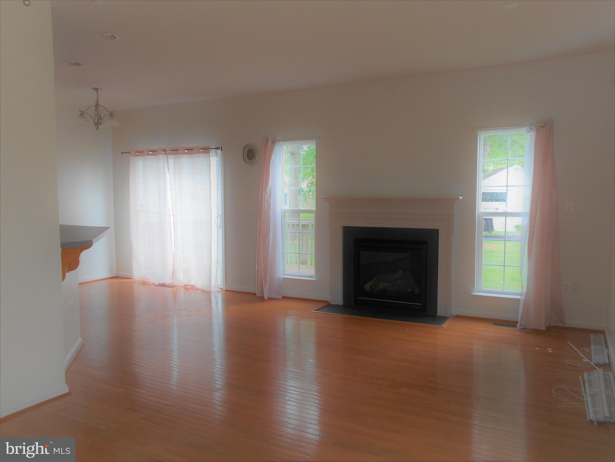 306 Appleby School Road Cambridge, MD 21613 - Photo 3 of 24 Living Room w/Gas fireplace