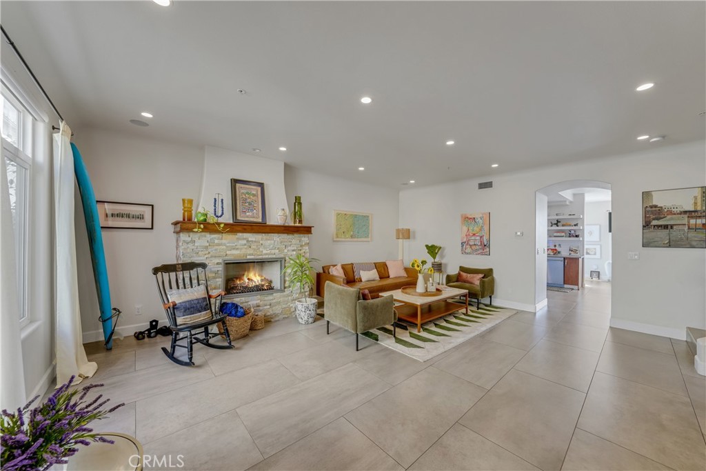 308 5th Street Huntington Beach, CA 92648 - Photo 21 of 41 a view of a livingroom with furniture and a couch