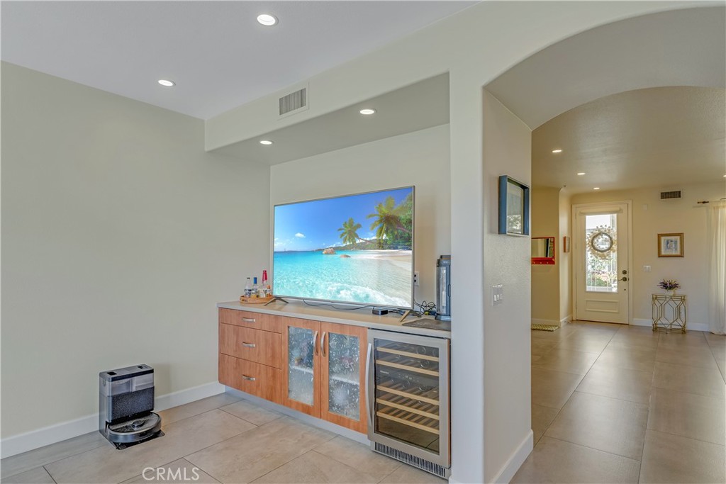 308 5th Street Huntington Beach, CA 92648 - Photo 26 of 41 a room with furniture and wooden floor