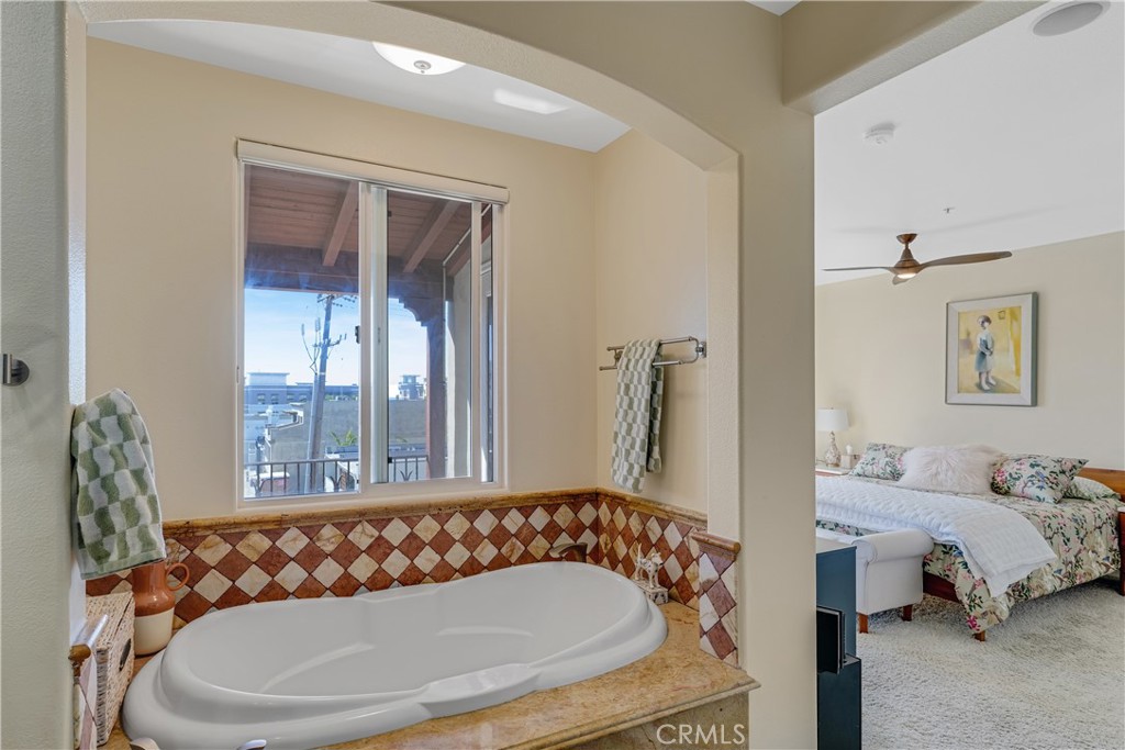 308 5th Street Huntington Beach, CA 92648 - Photo 34 of 41 a bathroom with a sink and a mirror