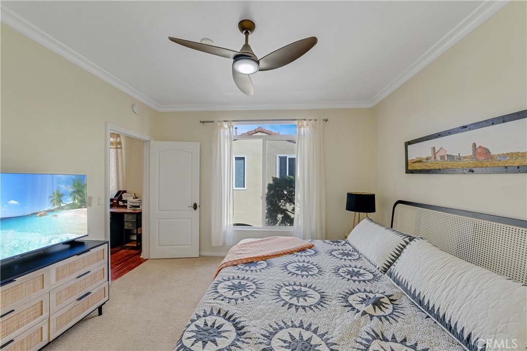 308 5th Street Huntington Beach, CA 92648 - Photo 38 of 41 a bedroom with a large bed and a dresser