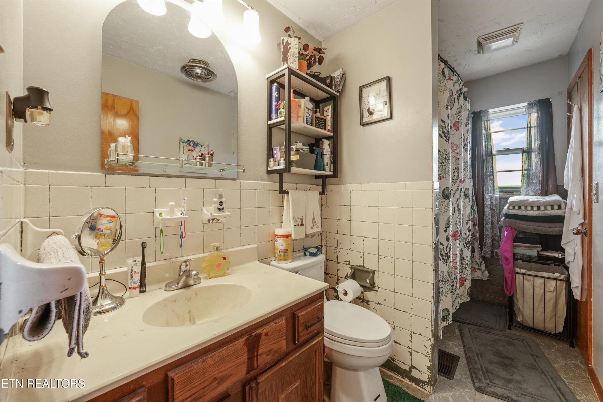 960 Talbott-Kansas Road Talbott, TN 37877 - Photo 19 of 43 a bathroom with a sink toilet and shower
