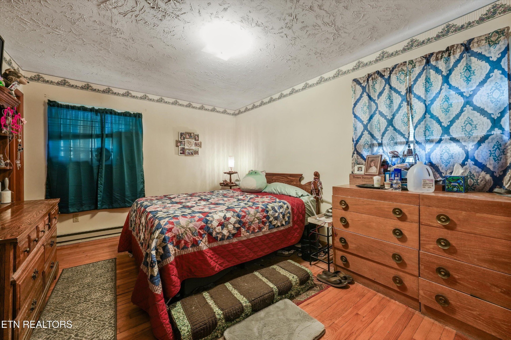 960 Talbott-Kansas Road Talbott, TN 37877 - Photo 21 of 43 a bedroom with a bed and a dresser