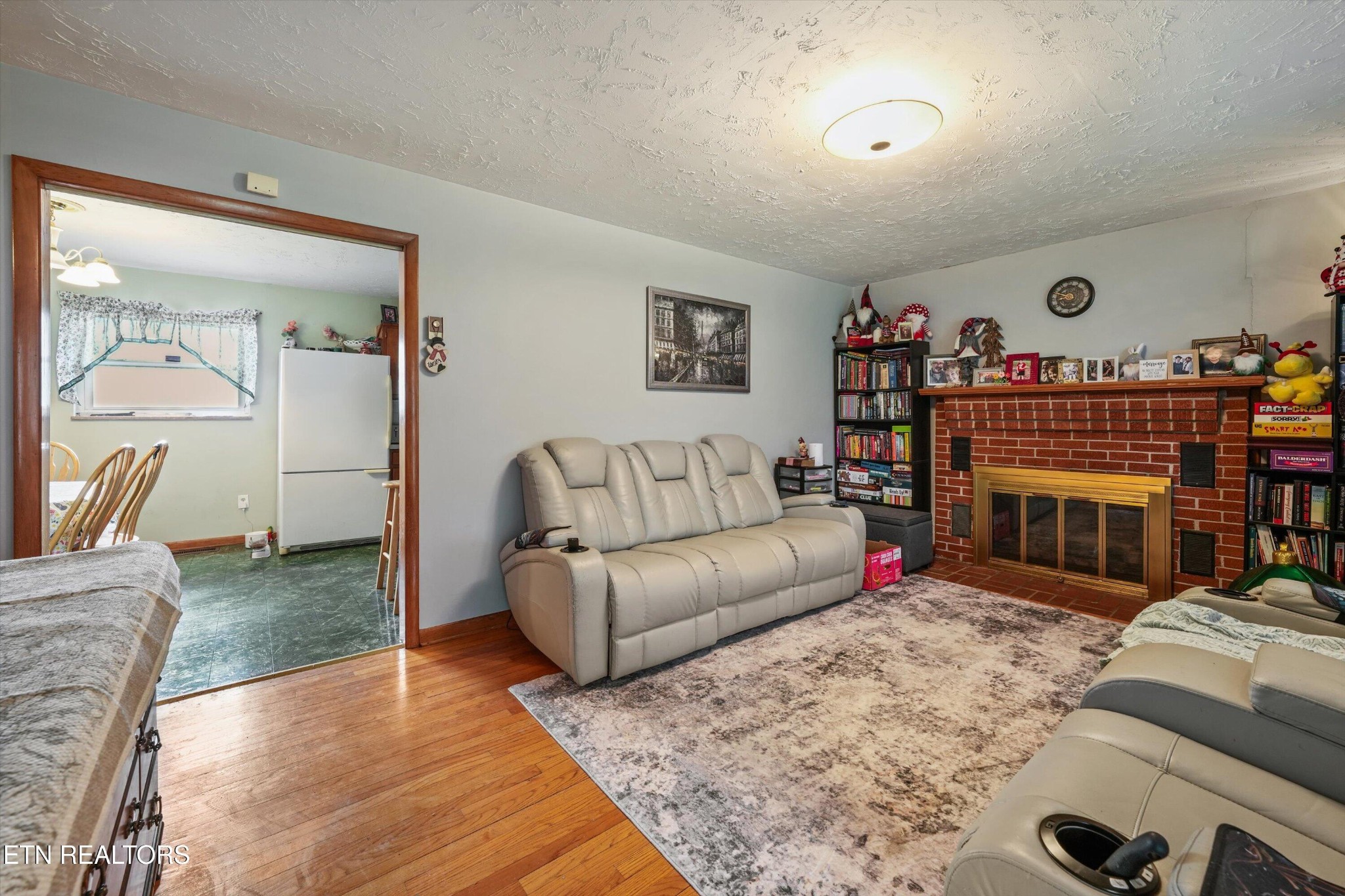 960 Talbott-Kansas Road Talbott, TN 37877 - Photo 7 of 43 a living room with furniture a rug and a flat screen tv