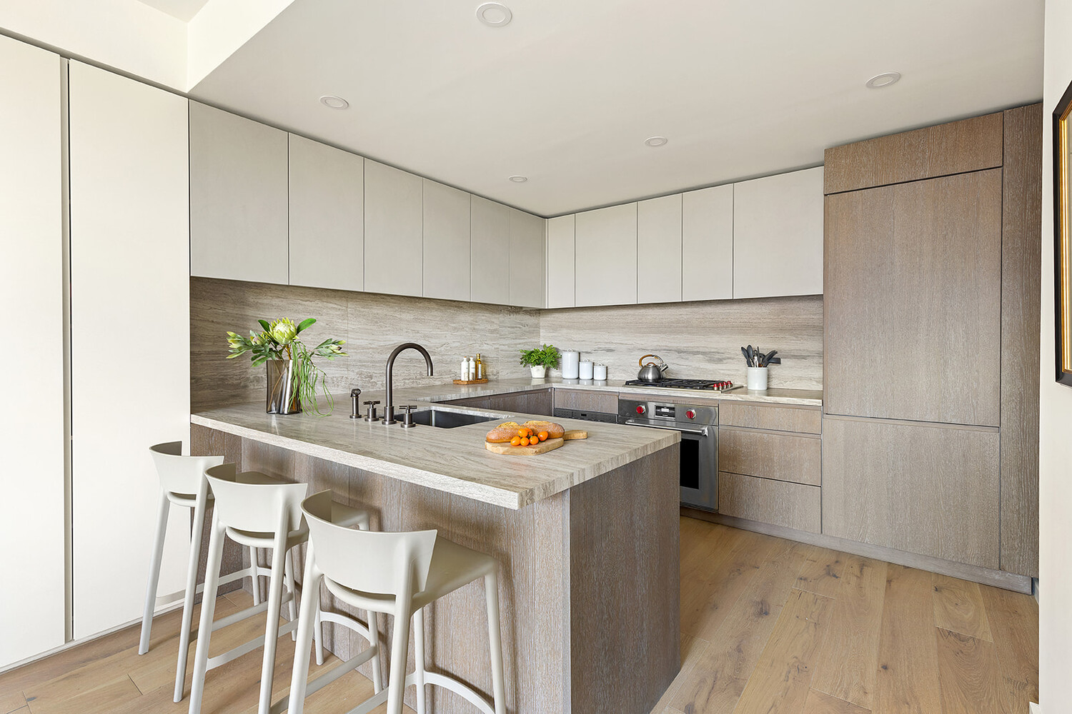 66 Clinton Street, Unit 5B Manhattan, NY 10002 - Photo 2 of 14 a kitchen with stainless steel appliances granite countertop a sink stove and refrigerator