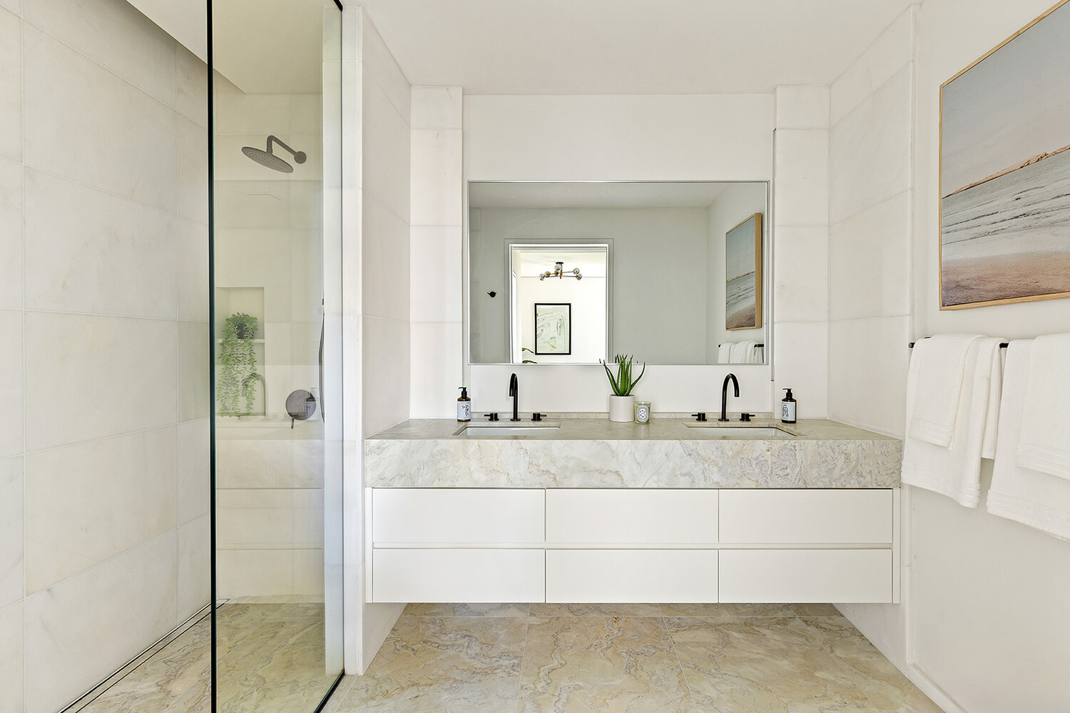 66 Clinton Street, Unit 5B Manhattan, NY 10002 - Photo 6 of 14 a bathroom with a granite countertop sink mirror and shower