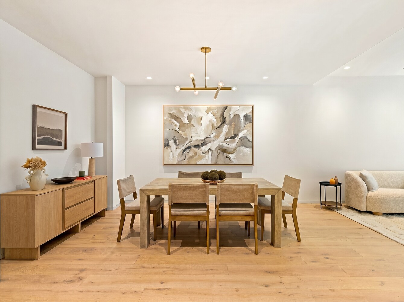66 Clinton Street, Unit 5B Manhattan, NY 10002 - Photo 9 of 14 a view of a dining room with furniture window and wooden floor