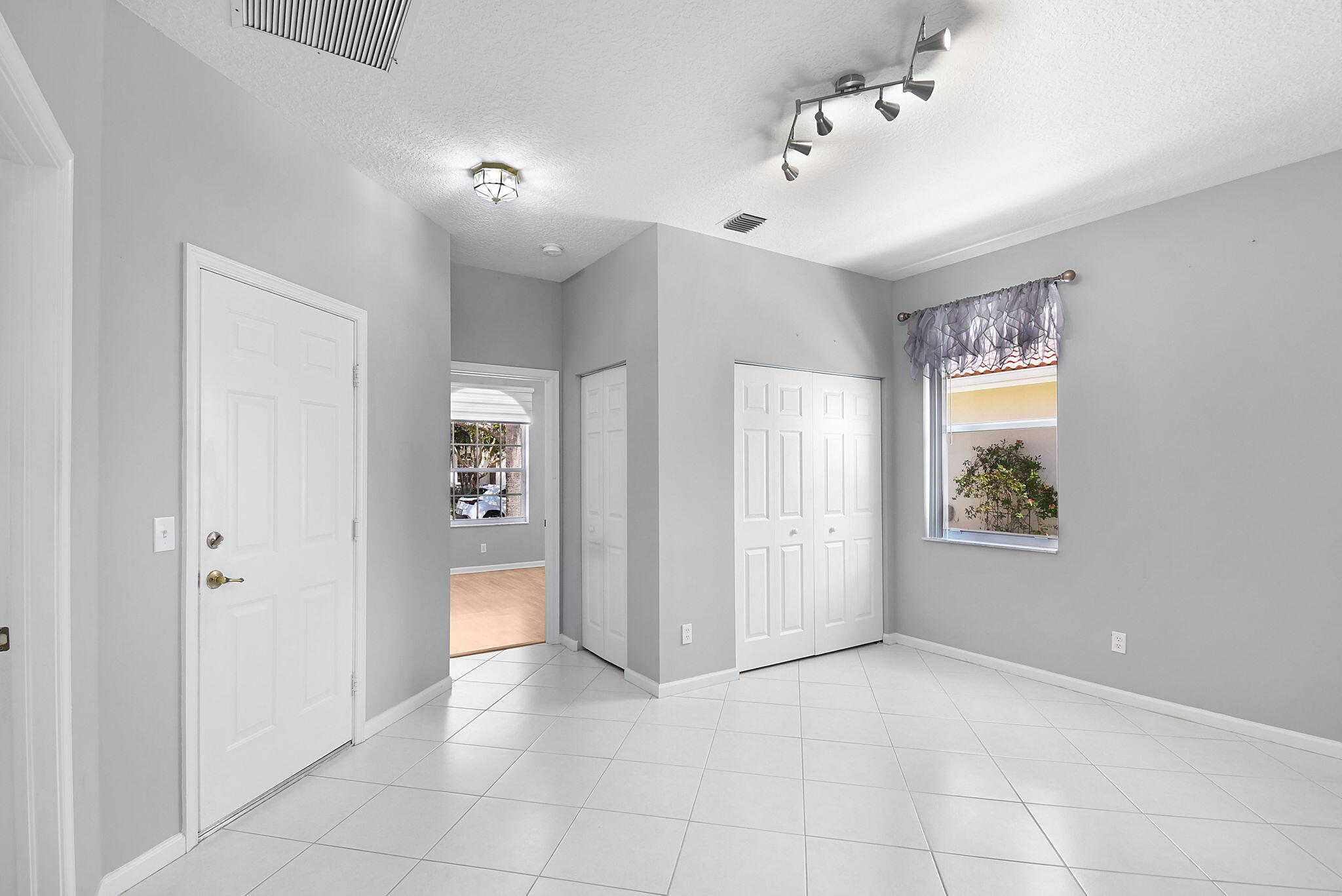 6785 Southeast Warwick Lane Stuart, FL 34997 - Photo 14 of 62 a view of an empty room