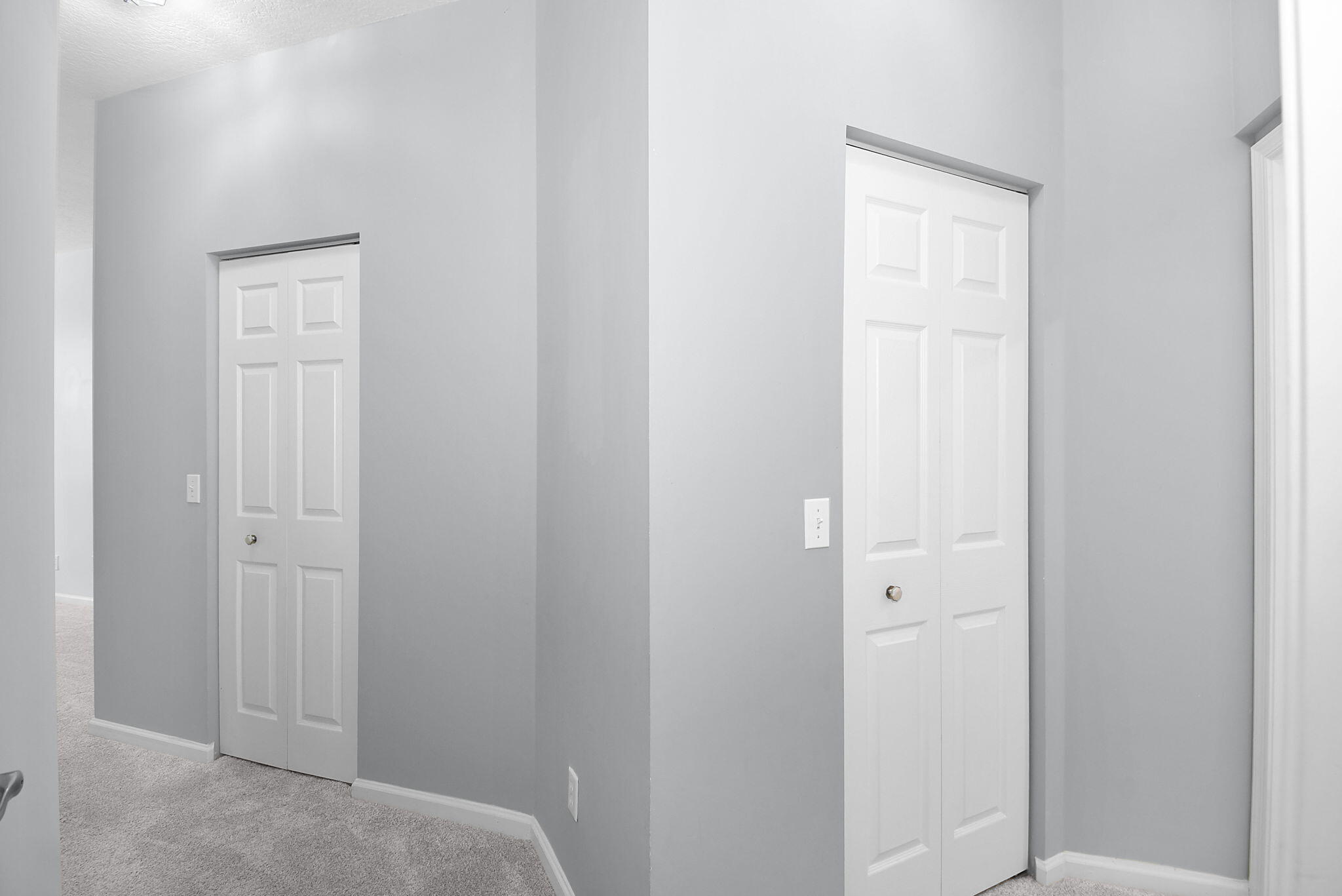 6785 Southeast Warwick Lane Stuart, FL 34997 - Photo 20 of 62 WALKWAY TO GUEST BEDROOM