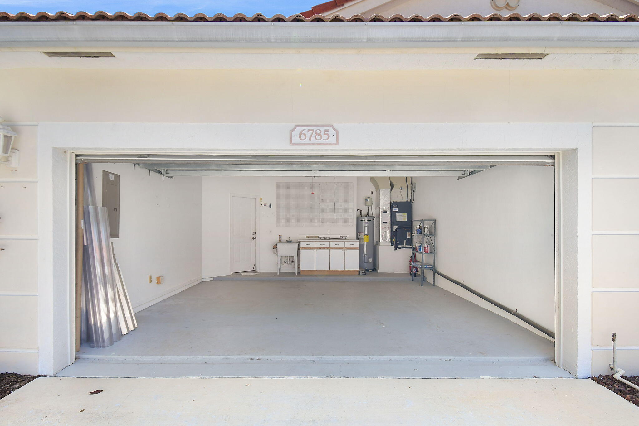 6785 Southeast Warwick Lane Stuart, FL 34997 - Photo 26 of 62 a view of a garage